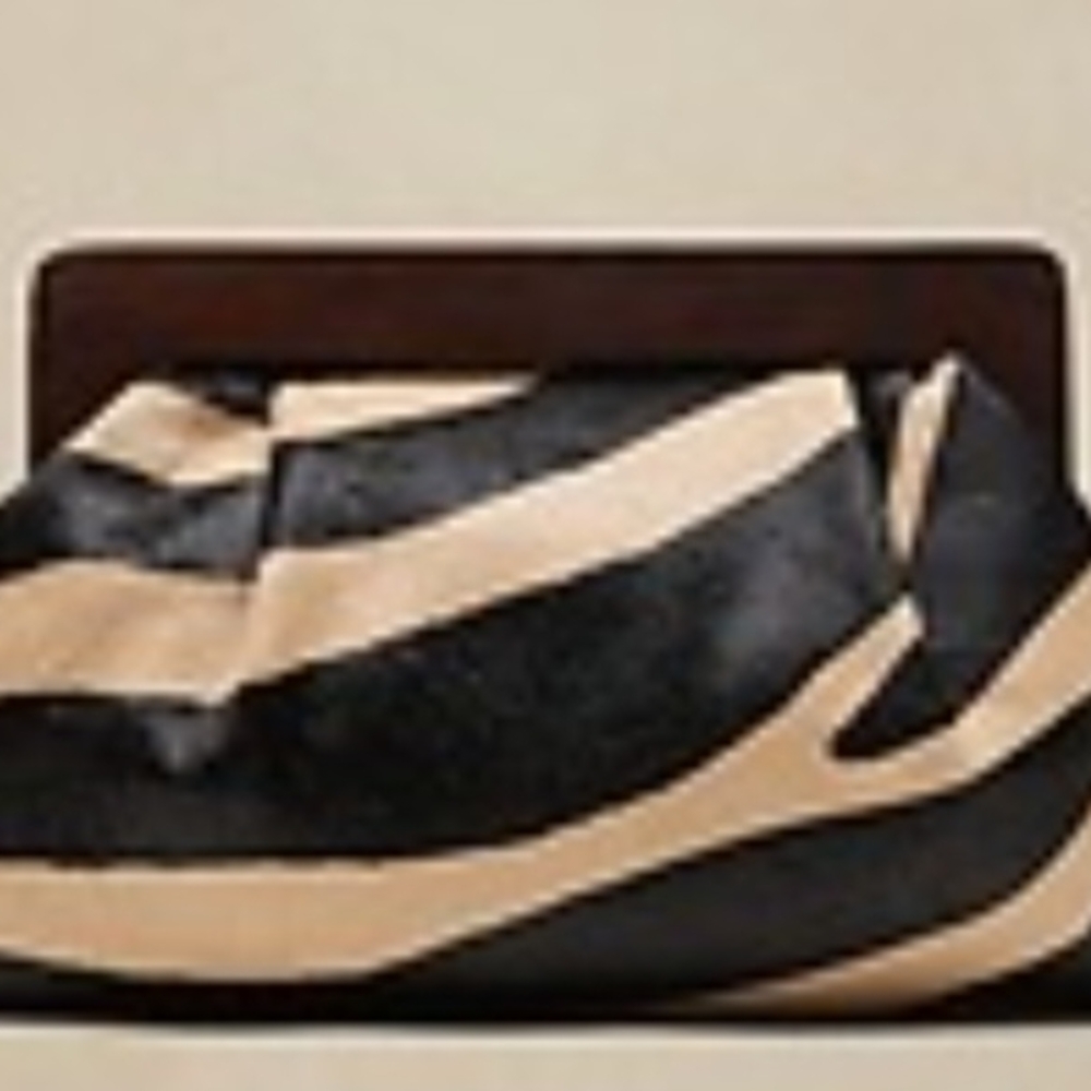 IN SEARCH OF...NOT SELLING...Banana Republic Elegant Black and Tan Clutch